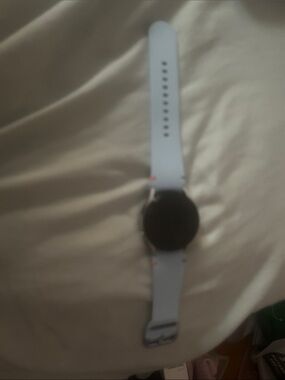 Minimalist Round Smartwatch with Light Blue Band